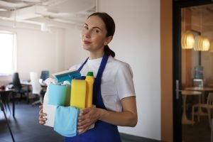 professional cleaning service person cleaning office
